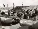 image for James R. Lowe's Lotus XI Clubman #39 and Marion Lowe's Lotus XI Clubman #38. Bill Breeze at far right. Laguna Seca, 1958. Possibly November, 1957? Photo credit Stephen Holman.